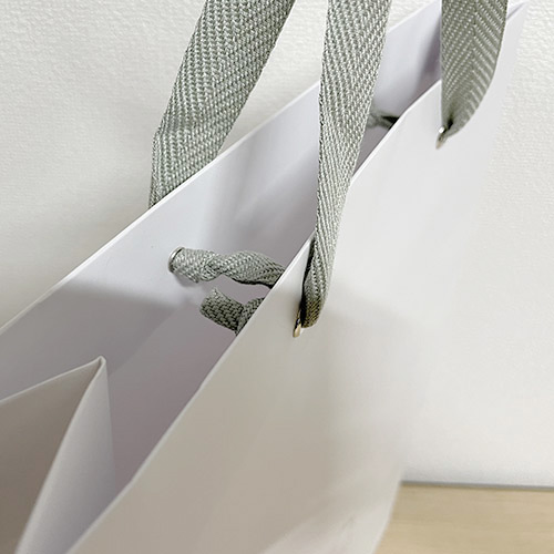 オリジナル紙袋　1色印刷　コート紙　アクリル平紐　ハトメ