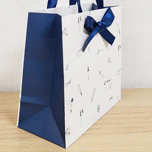 ネイビーのリボン結びでおしゃれなショッパー | バッグファクトリー